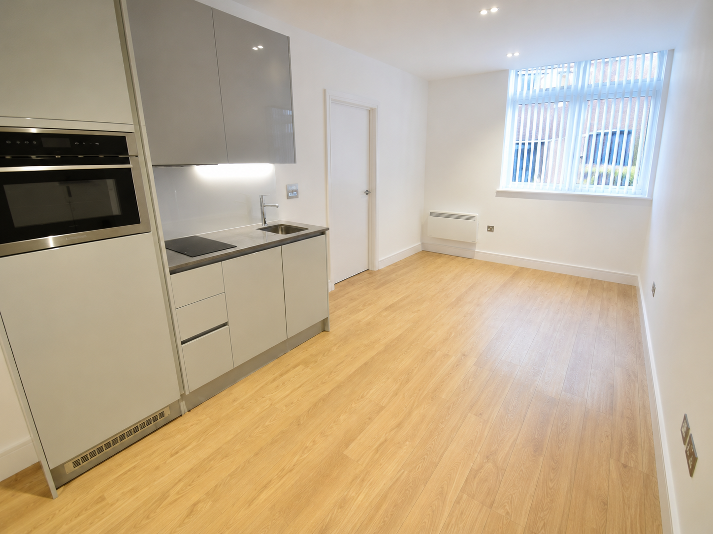 Landlord and lettings agent shaking hands after agreeing to manage a rental property